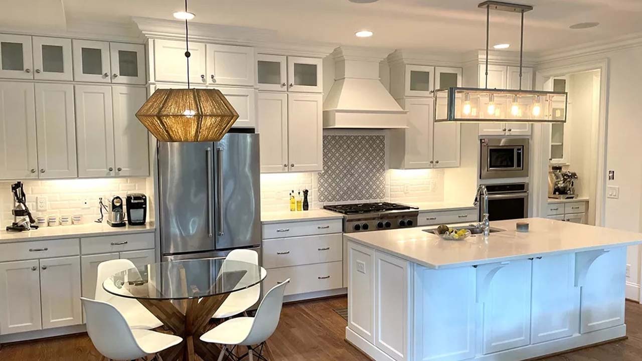 A beautiful newly renovated kitchen with white paint interior.