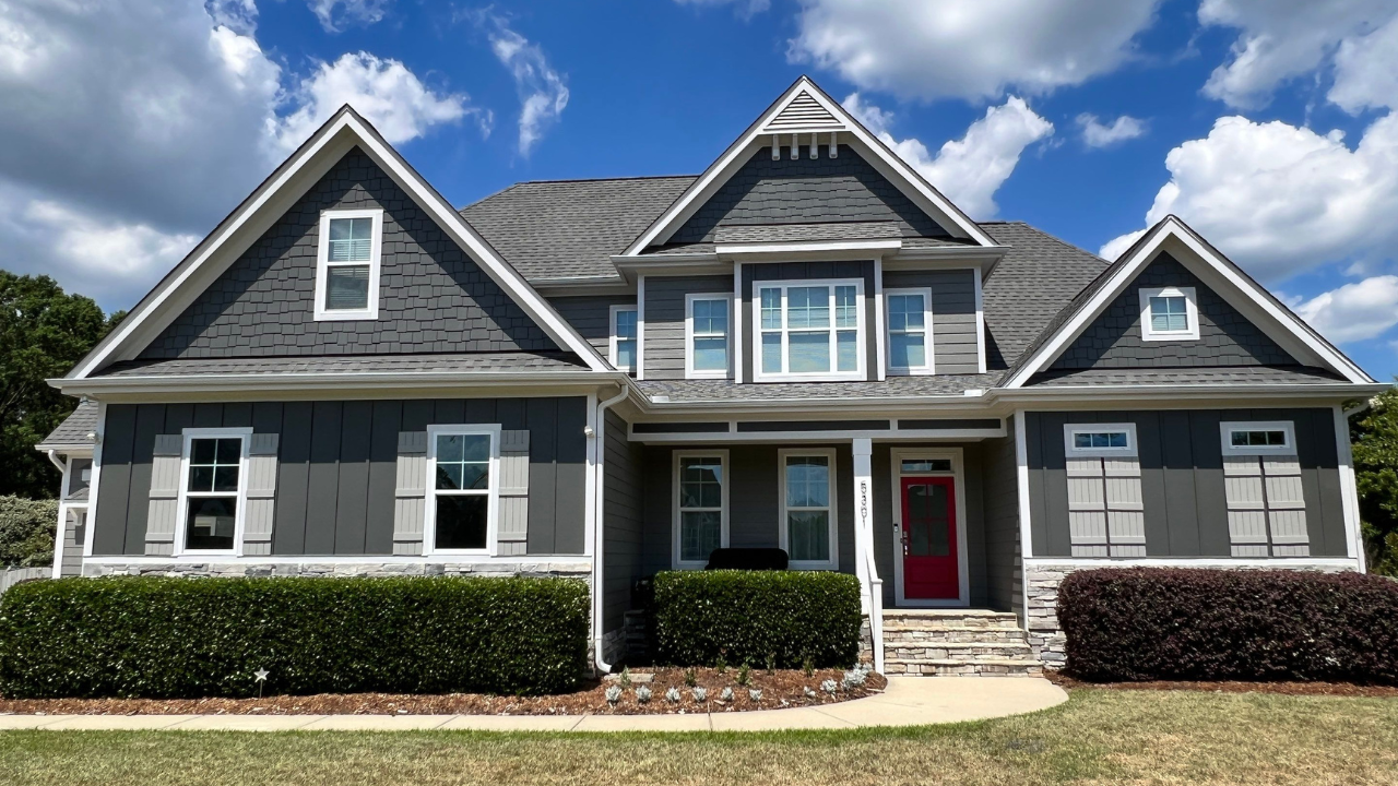 A stunning view of a Raleigh home after its professional exterior painting makeover.