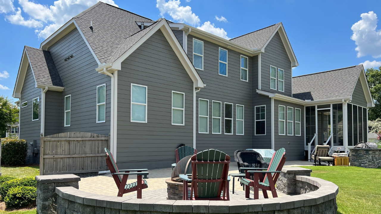 An image highlighting a Raleigh home’s stunning exterior makeover with a fresh coat of paint.