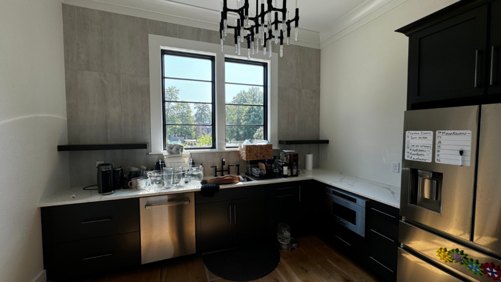 An image of Kylie Slavin's elegantly painted kitchen, showcasing a seamless blend of modern style and sophistication.