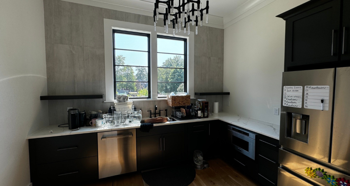 An image of Kylie Slavin's elegantly painted kitchen, showcasing a seamless blend of modern style and sophistication.