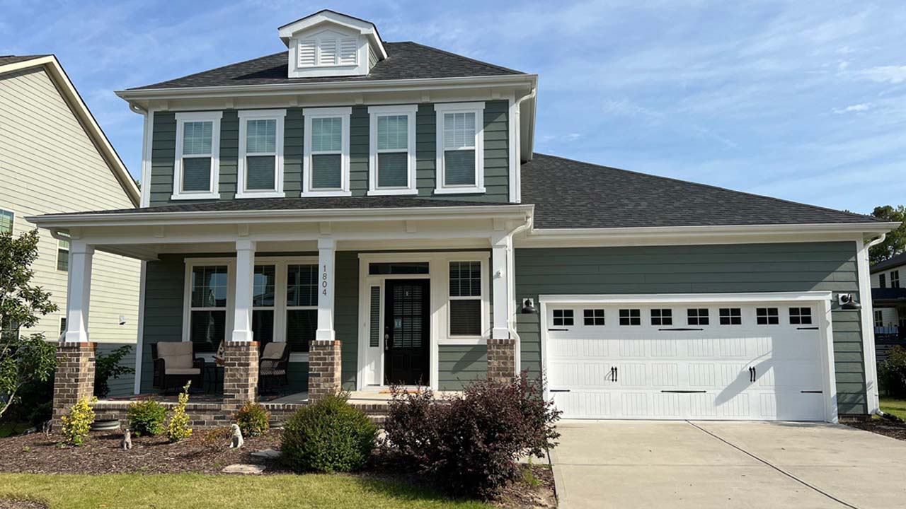 A newly painted house, with graying undertone.