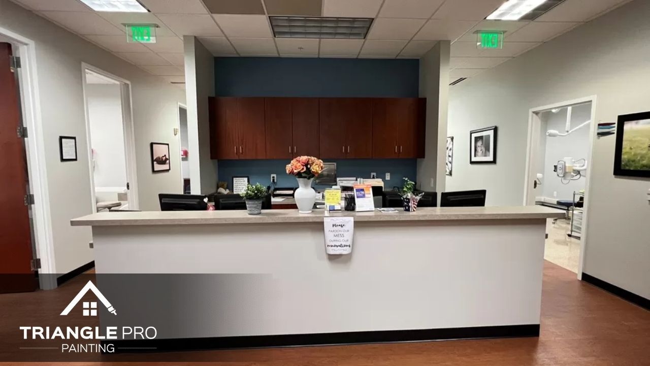 freshly painted white and blue walls create a welcoming space by Triangle Pro Painting.