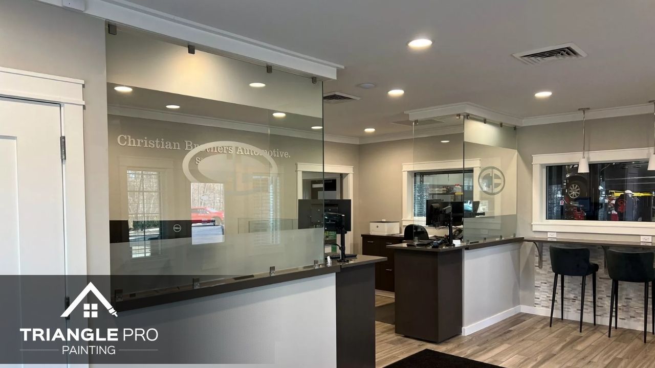 This is a commercial office interior with neutral wall colors and clean finishes painted by Triangle Pro Painting in Moore Square Raleigh, NC.