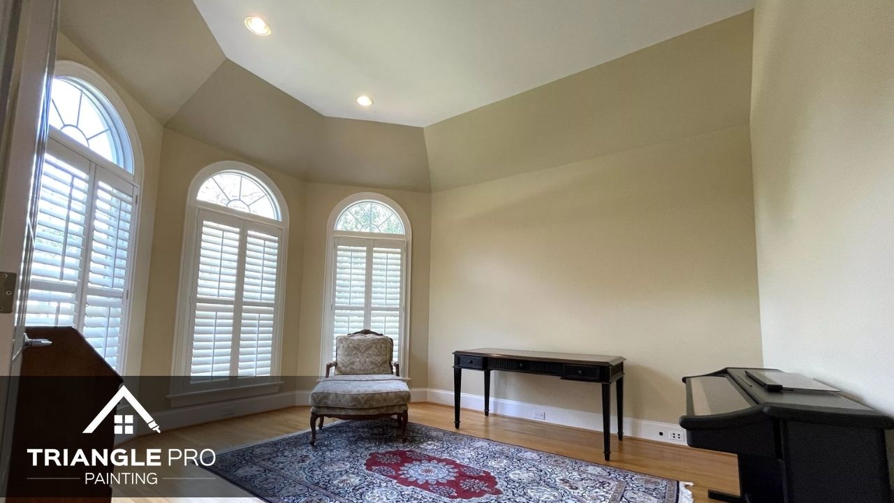 This is an interior room painting project with soft neutral tones and natural light by Triangle Pro Painting.