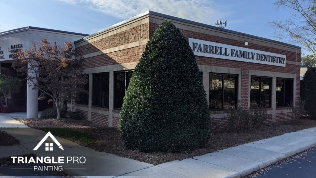 An image of an exterior of a dental clinic in Raleigh, Nc that is painted with red paint.