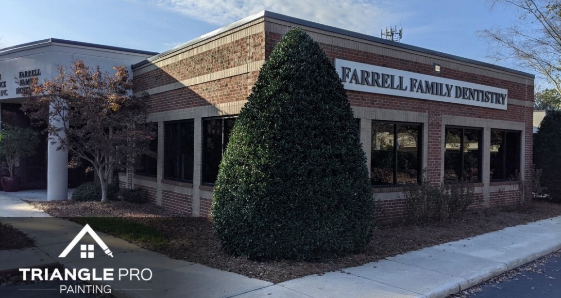An image of an exterior of a dental clinic in Raleigh, Nc that is painted with red paint.