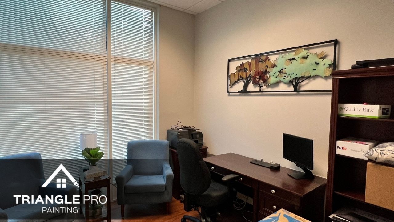 An interior painting of an office in Fayetteville Street.