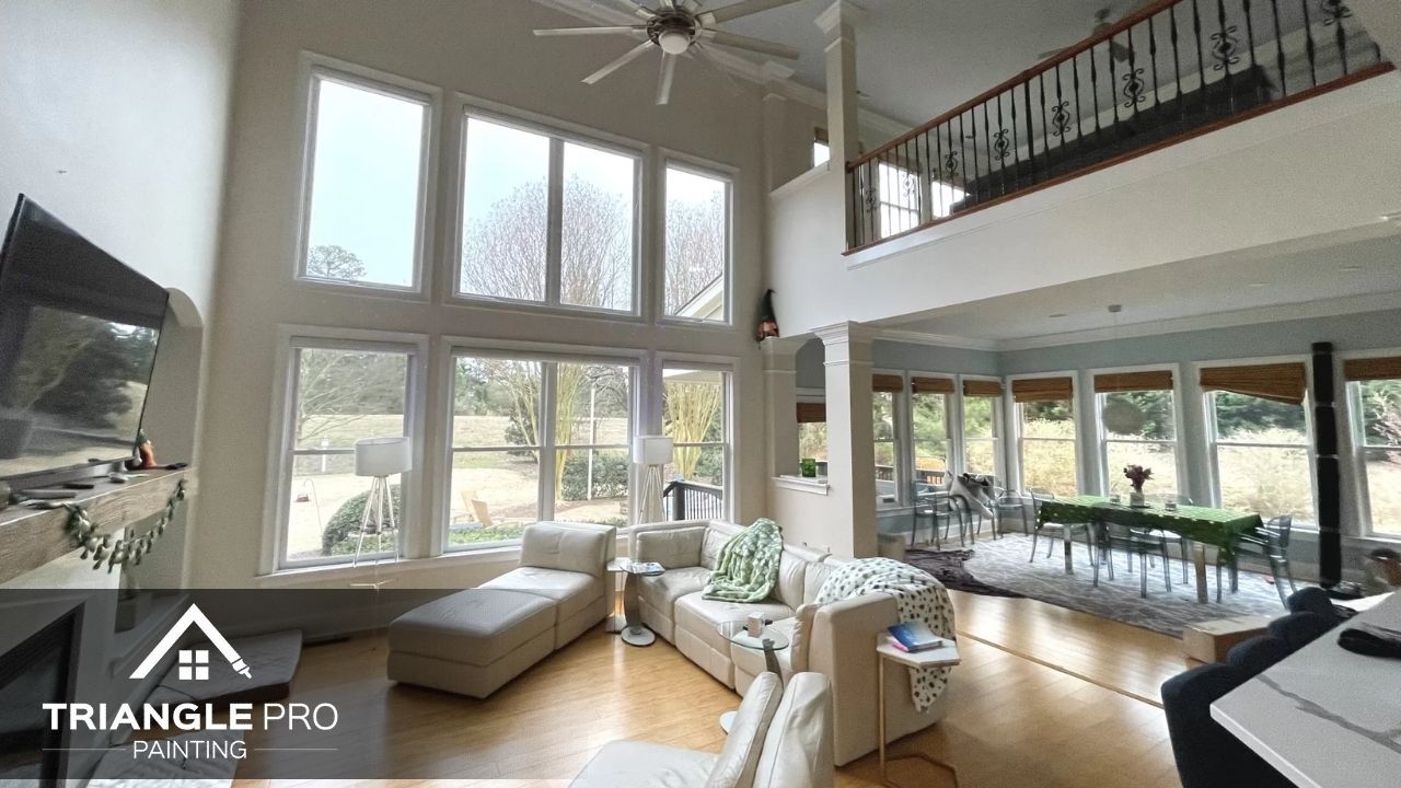 This is a spacious living room and sunroom painting project by Triangle Pro Painting in Umstead Raleigh, NC.