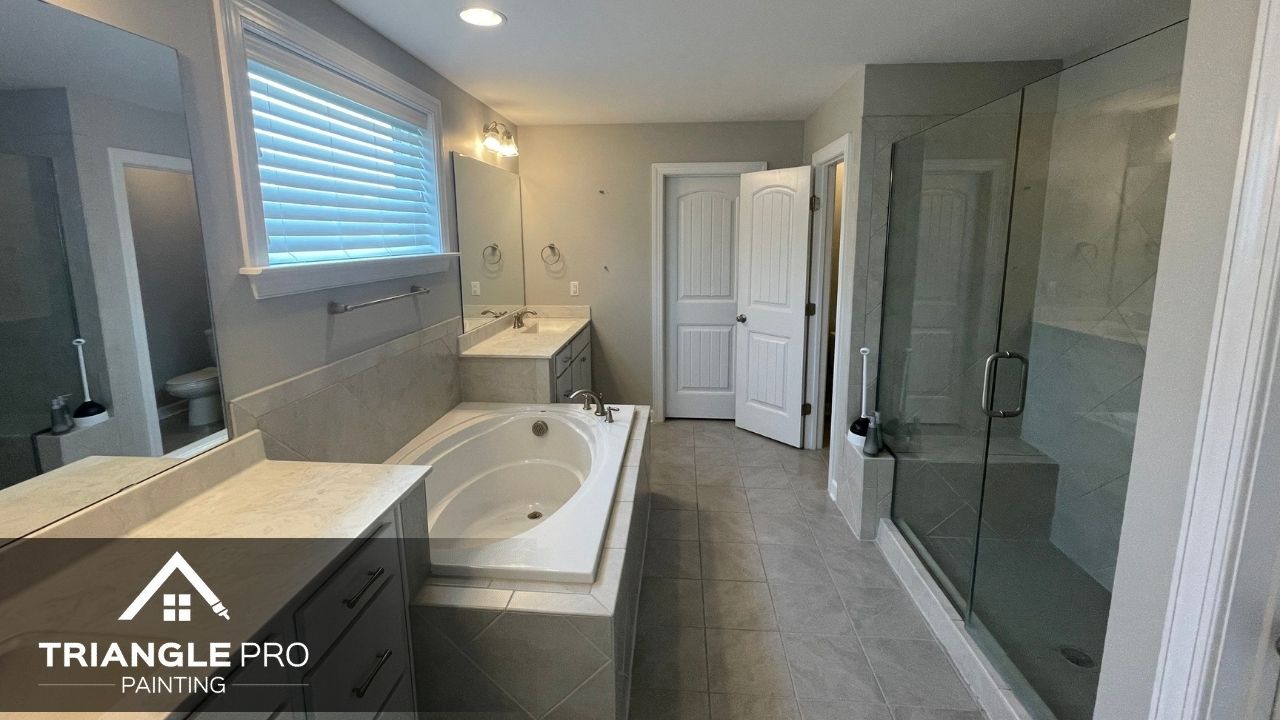 This photo displays a clean and modern bathroom interior painted by Triangle Pro Painting in Madonna Acres, Raleigh, NC.