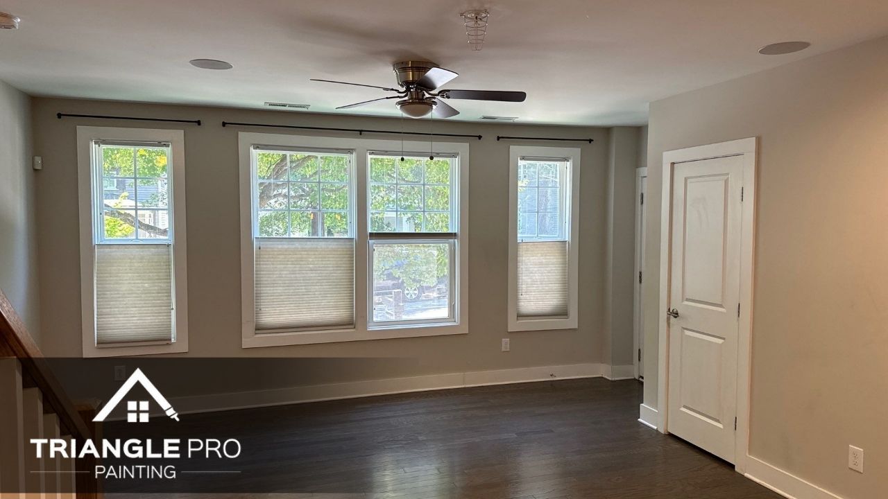 This is an image of a room that is newly painted using a green shade of paint