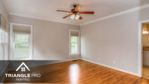 An interior of a house that is painted with white paint.