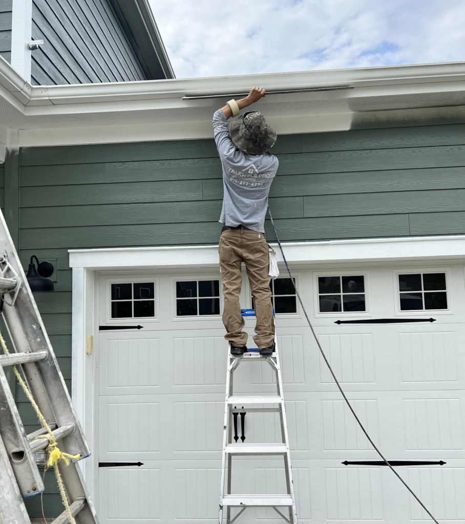 Experienced house painter in Chapel Hill, NC enhancing home appearance and durability