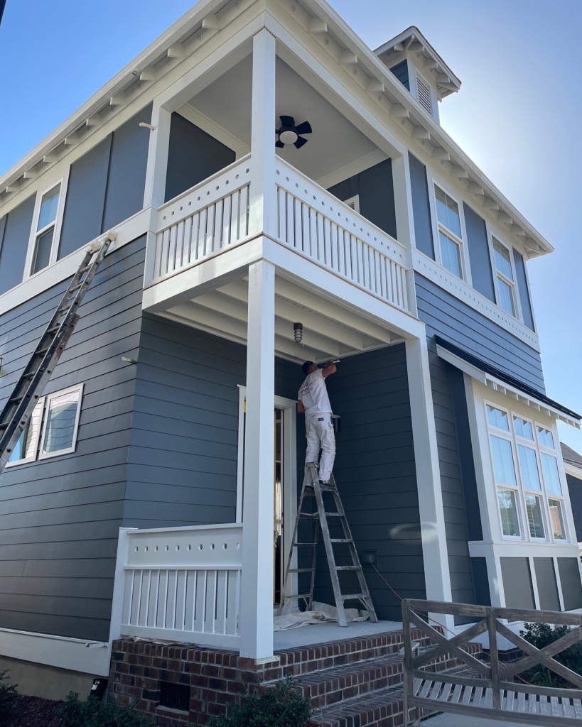 Experienced house painter in Raleigh, NC enhancing home appearance and value