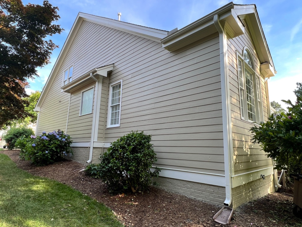 Expert siding painting services in Rolesville, NC protecting siding from NC weather