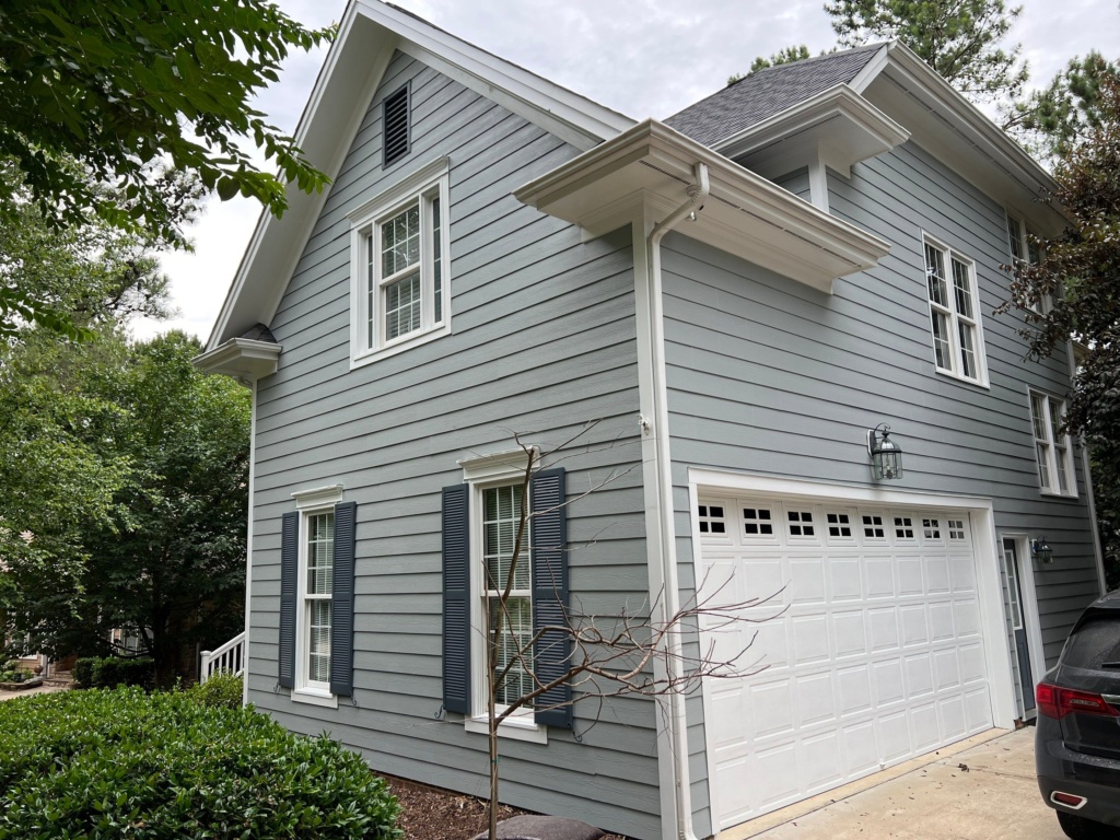 Expert siding painting services in Wake Forest, NC protecting siding from weather damage