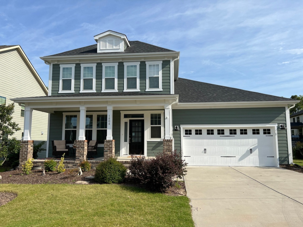 Professional siding painting in Fuquay-Varina, NC improving exterior durability