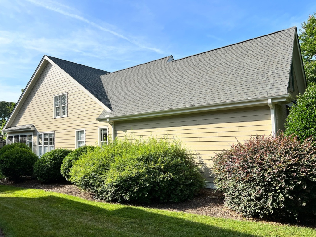 Professional siding painting in Holly Springs, NC improving exterior curb appeal
