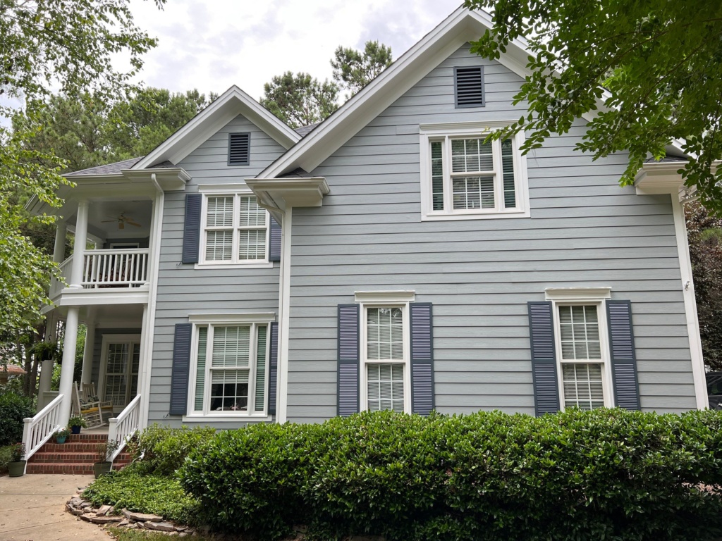 Professional siding painting in Morrisville, NC enhancing modern home exteriors