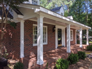 Exterior house painting project during ideal spring weather in Raleigh NC