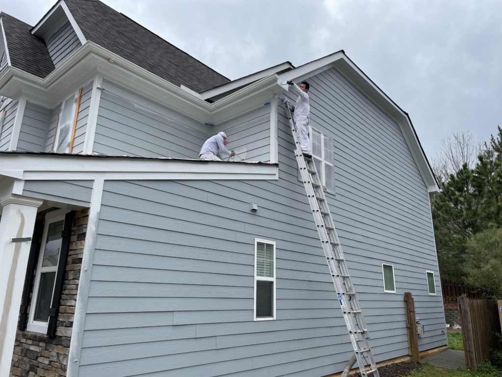 Experienced residential painting services in Youngsville, NC updating exterior surfaces for a polished home appearance