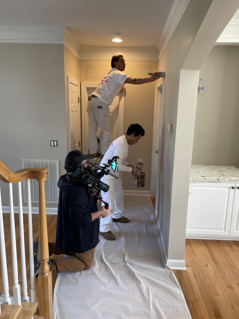 Professional residential painter in Clayton, NC refreshing interior walls with smooth, modern finishes