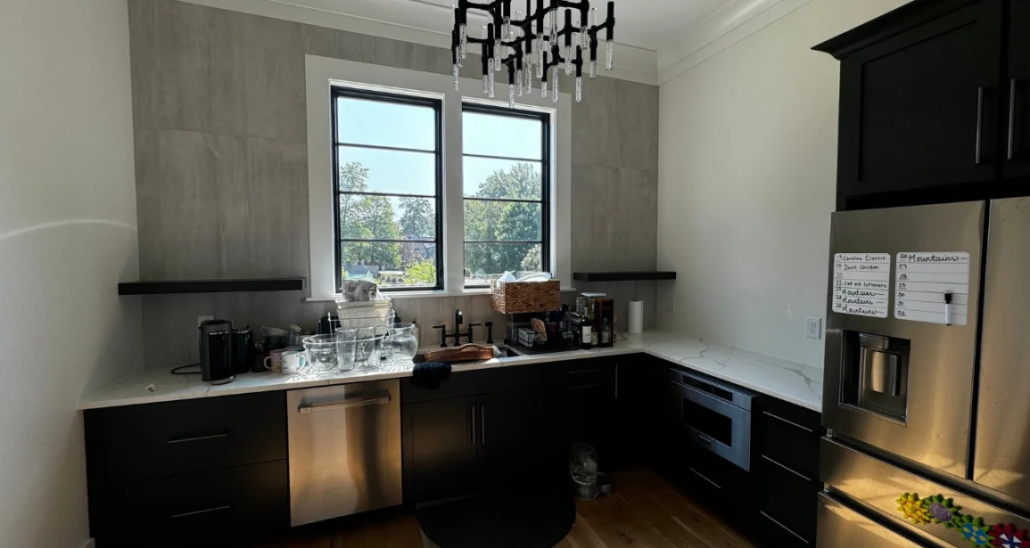 An image of Kylie Slavin's elegantly painted kitchen, showcasing a seamless blend of modern style and sophistication.