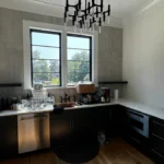 An image of Kylie Slavin's elegantly painted kitchen, showcasing a seamless blend of modern style and sophistication.