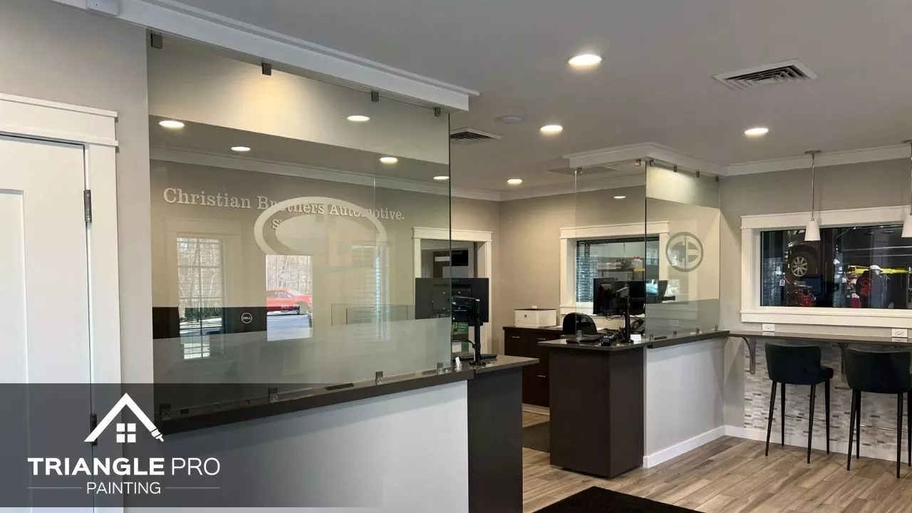 This is a commercial office interior with neutral wall colors and clean finishes painted by Triangle Pro Painting in Moore Square Raleigh, NC.