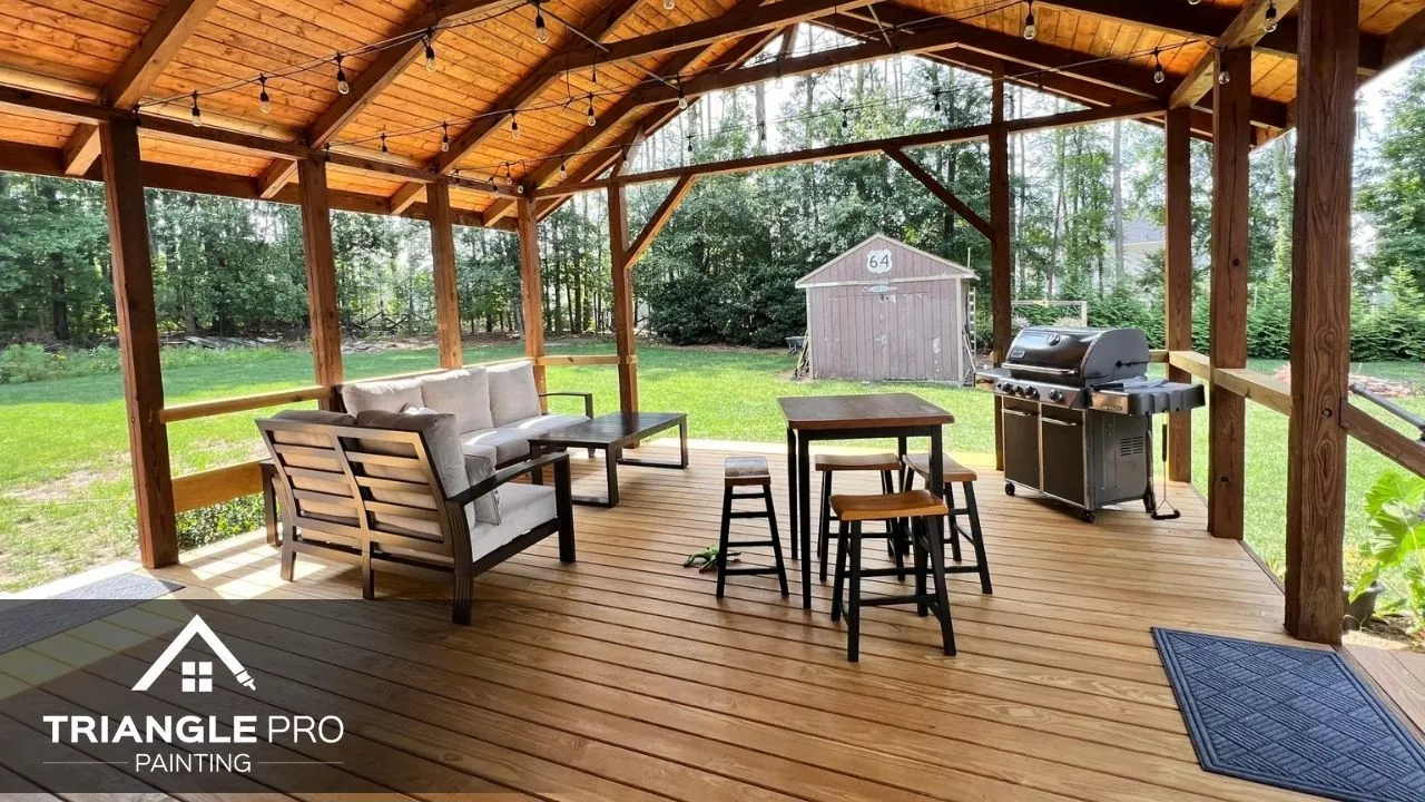 This is a backyard patio painting and staining project by Triangle Pro Painting in Wayland Heights Raleigh.