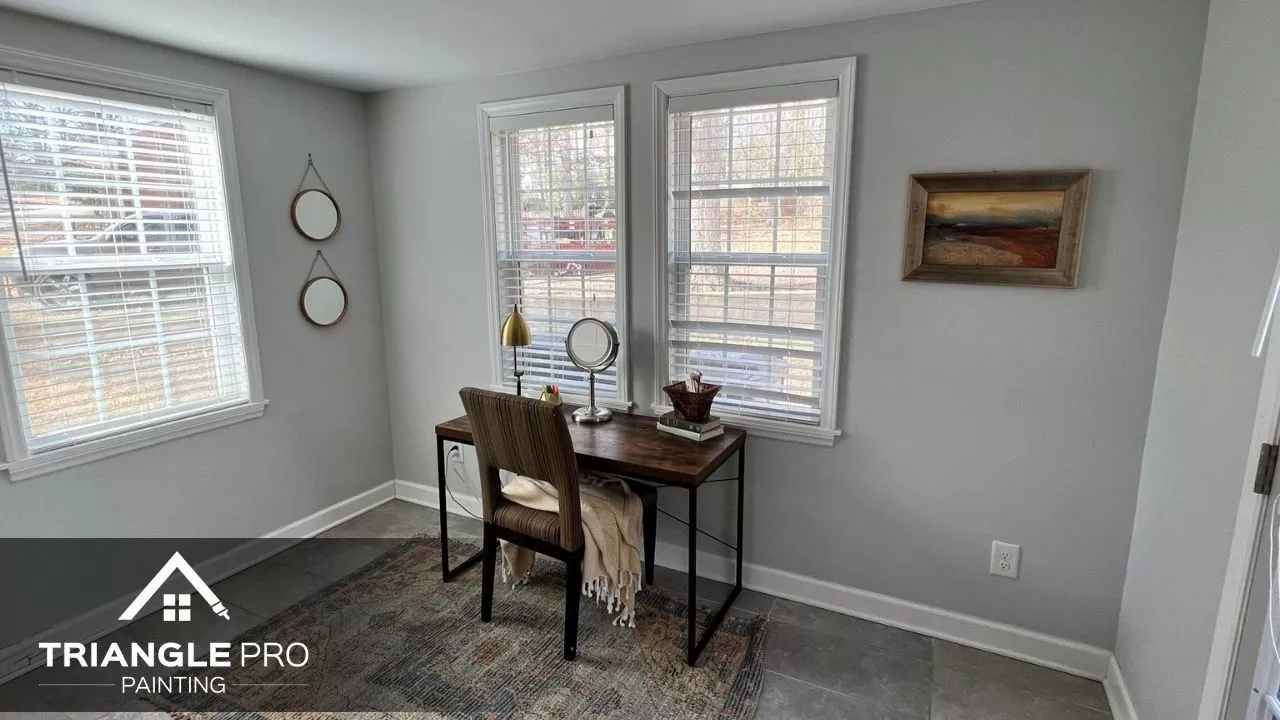 This is a bright home office with clean white walls and trim by Triangle Pro Painting in Umstead Raleigh NC.