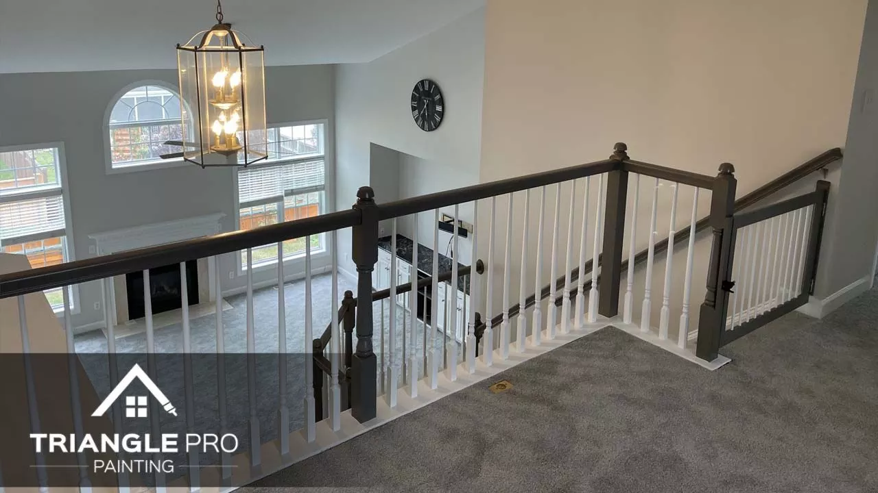 An image of a staircase and a wall newly painted.