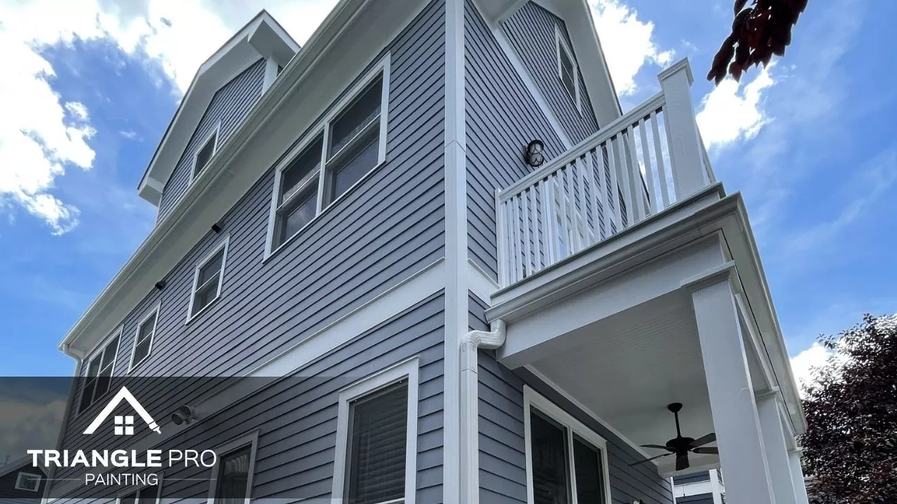 This is a multi-story exterior house painting by Triangle Pro Painting in Wayland Heights Raleigh, NC.