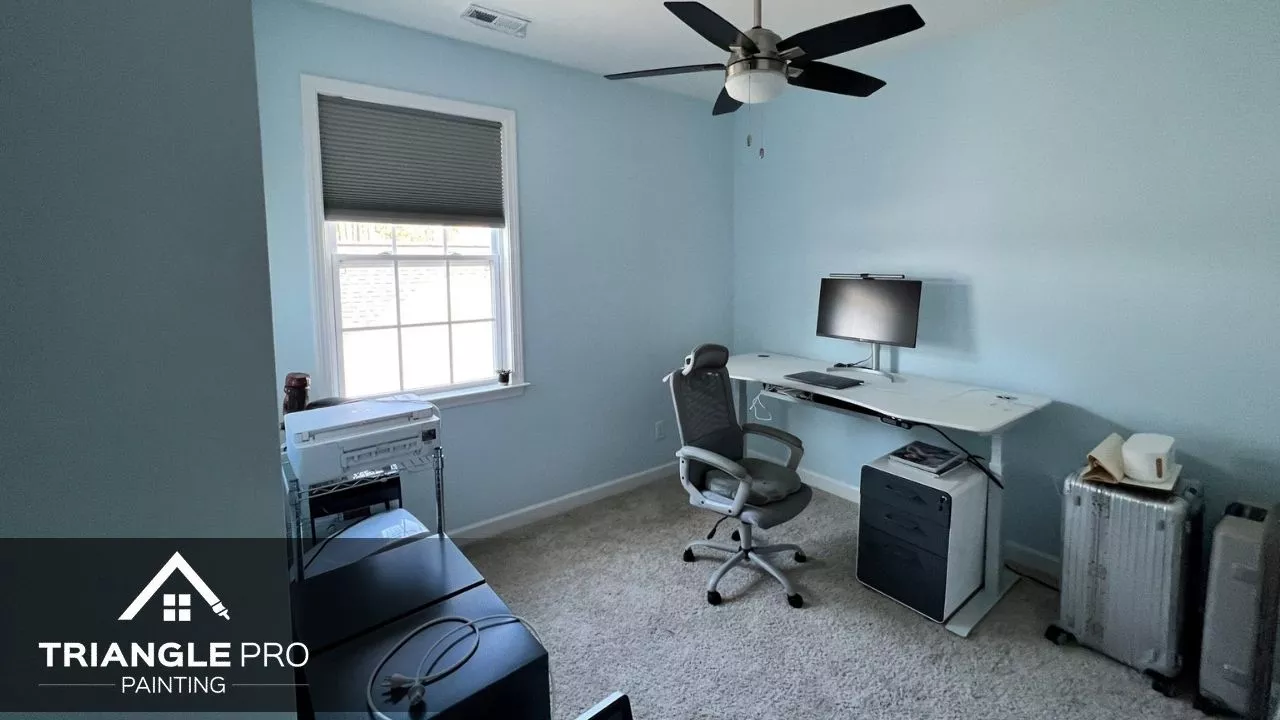 This is a light blue painted home office in Umstead Raleigh by Triangle Pro Painting.