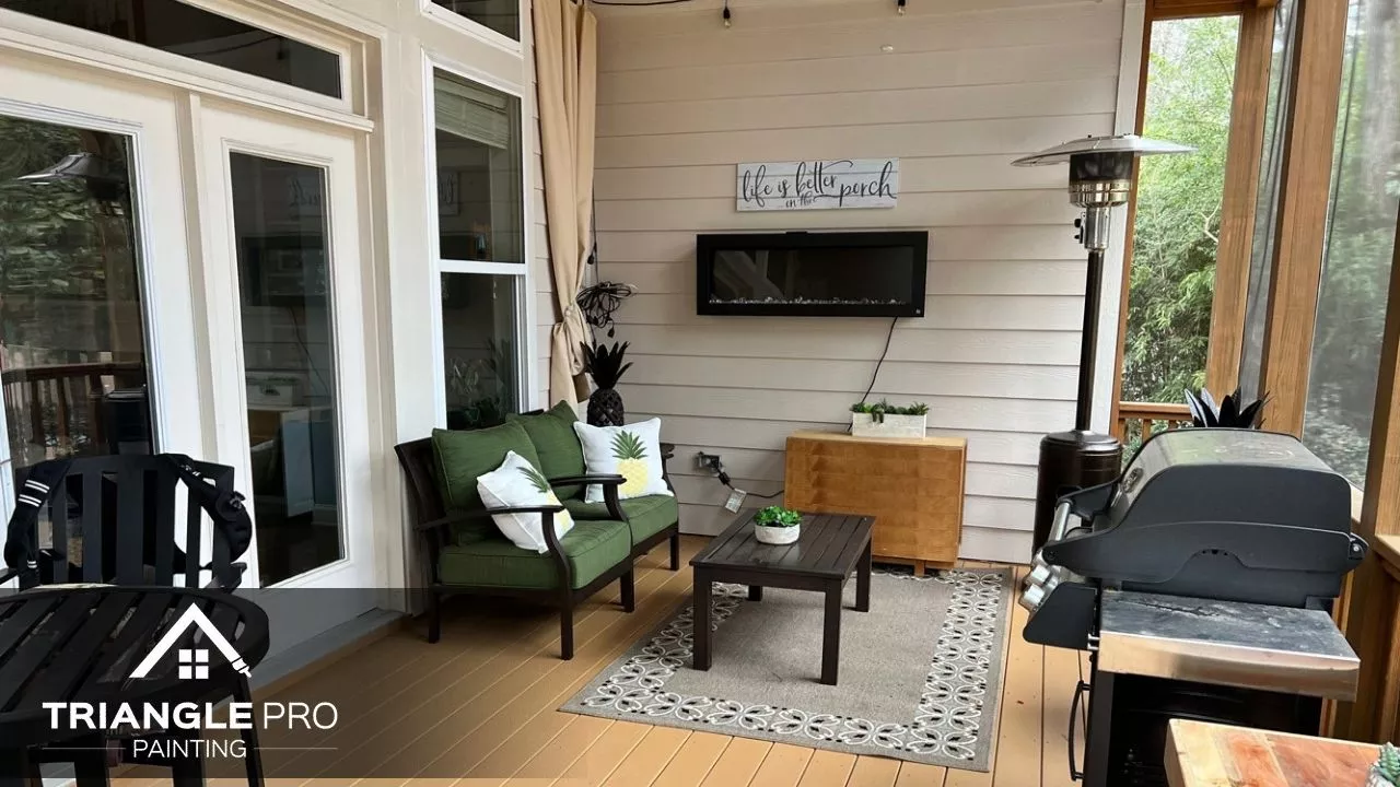 This is a covered patio painting with wood and siding finishes by Triangle Pro Painting in Wayland Heights Raleigh.