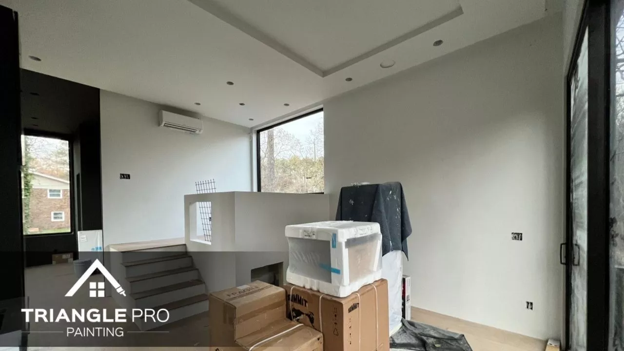 A commercial space in Raleigh, NC that is painted with white paint.