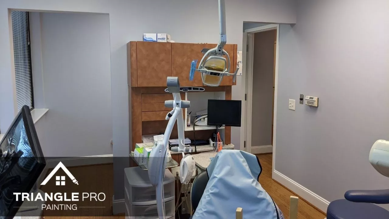 A dental clinic in Raleigh, Nc that is painted with light blue paint.