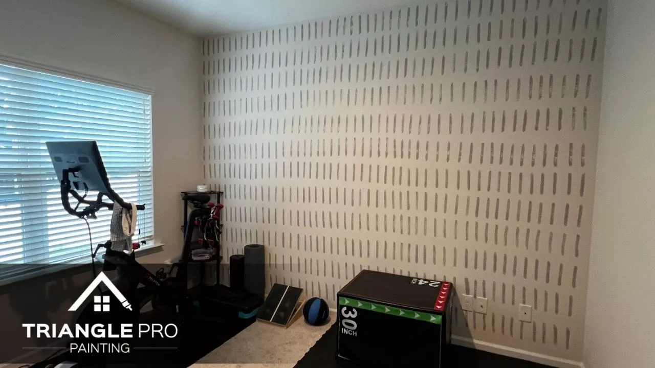 A wall painted with white paint in Raleigh, NC.