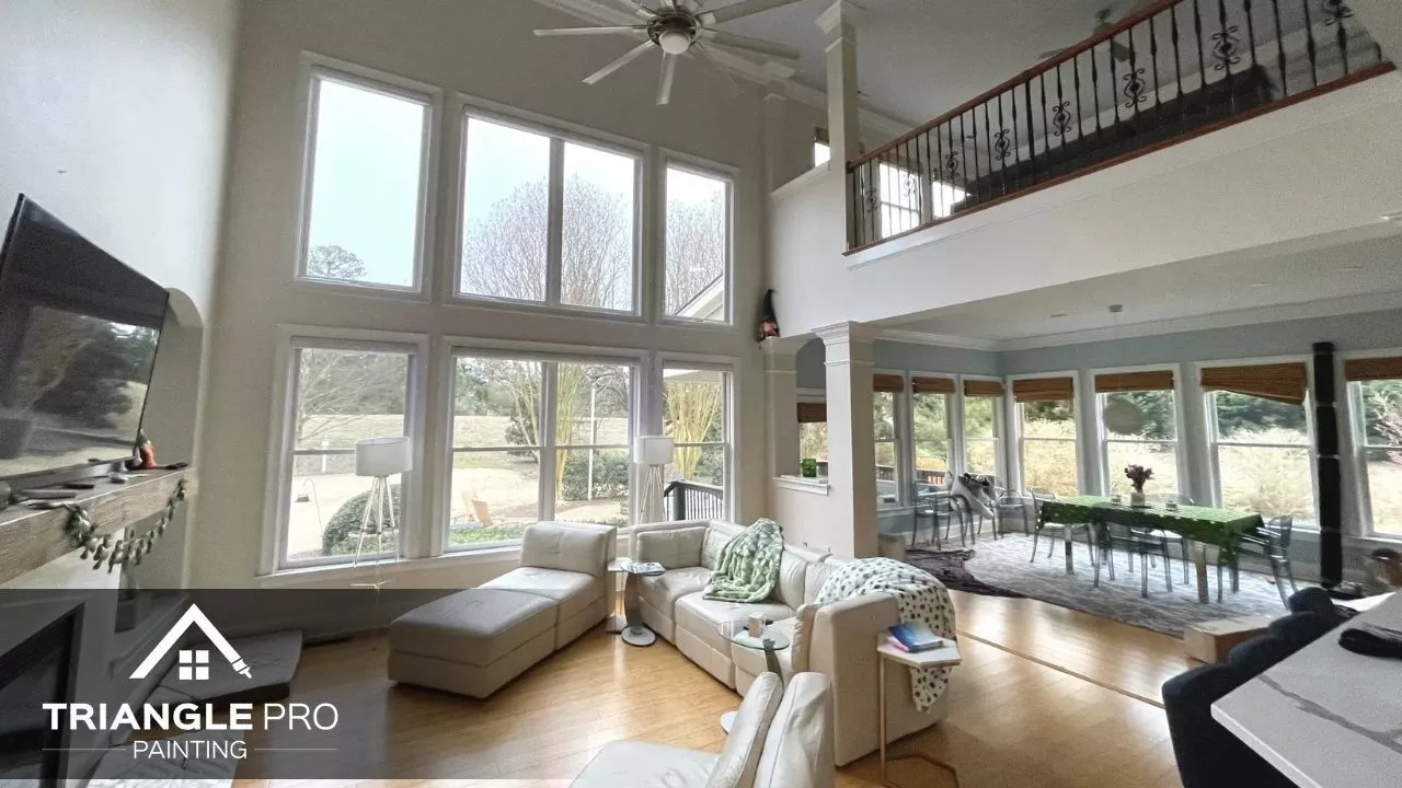 This is a spacious living room and sunroom painting project by Triangle Pro Painting in Umstead Raleigh, NC.