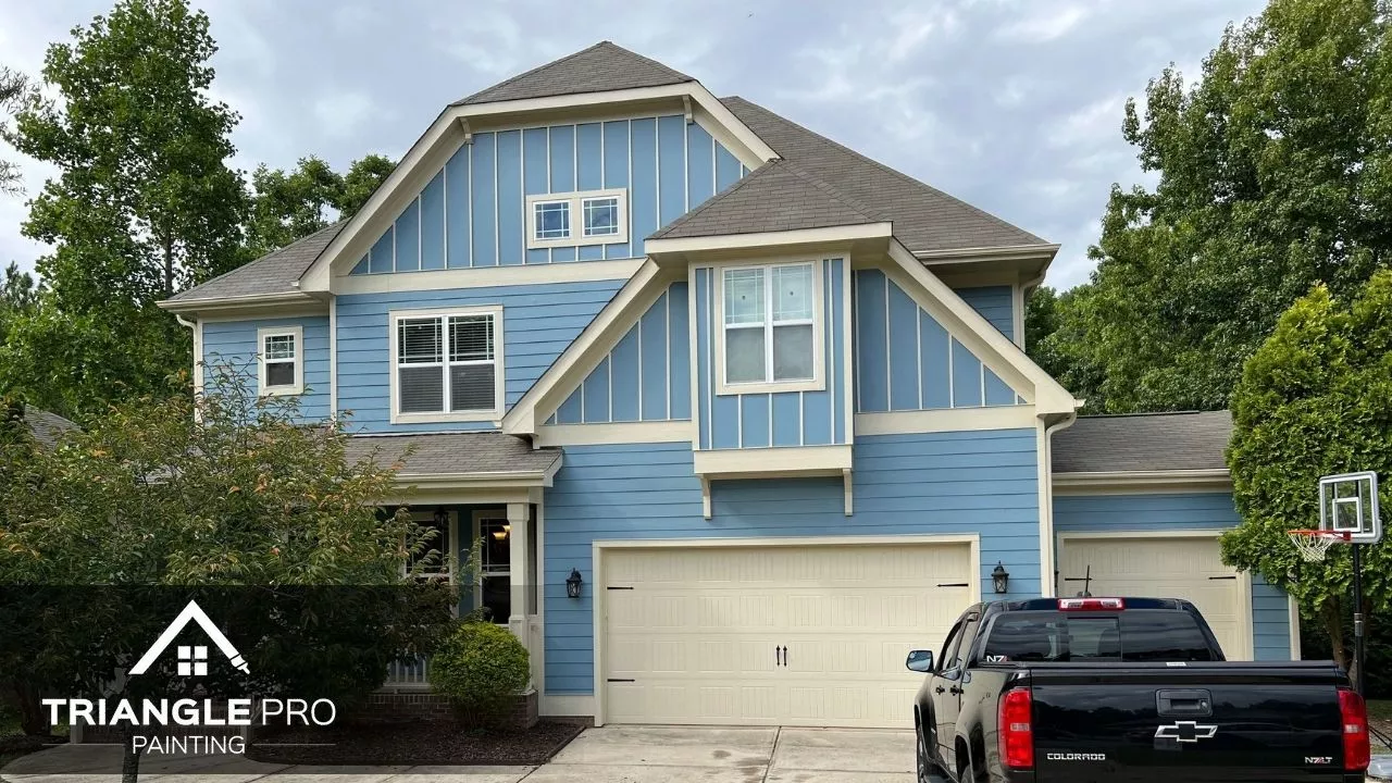 This is a front view of an exterior house painting completed by Triangle Pro Painting in Boylan Heights Raleigh NC.